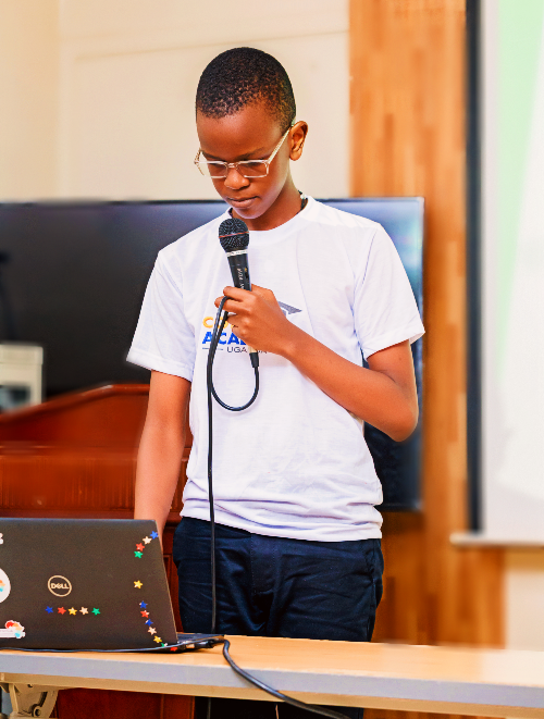 Students learning to code in a modern, bright classroom setting